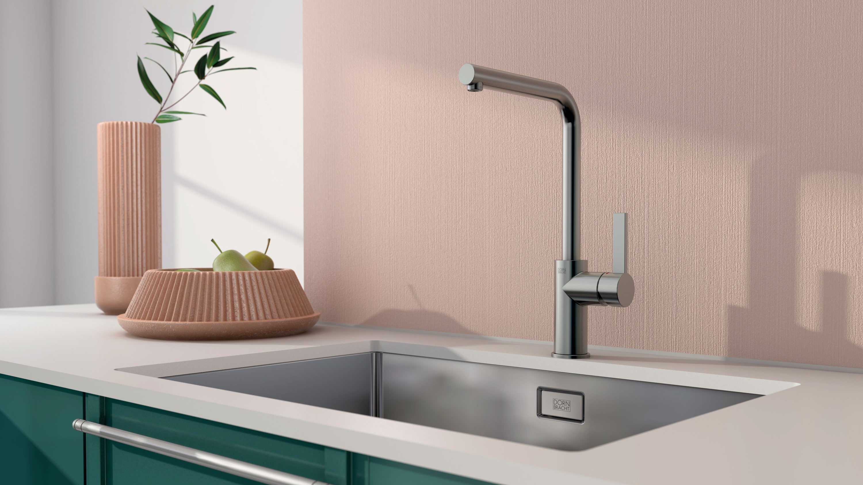 Modern kitchen sink with faucet and decorative elements on a light background