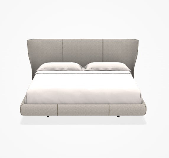 Gray upholstered bed with white bedding on a white background